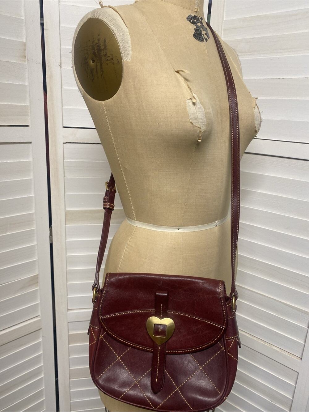 Dooney & Bourke Heart Buckle Leather Flap Saddle Bag Crossbody in Red